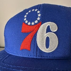 Philadelphia 76ers Blue Snapback Hat.